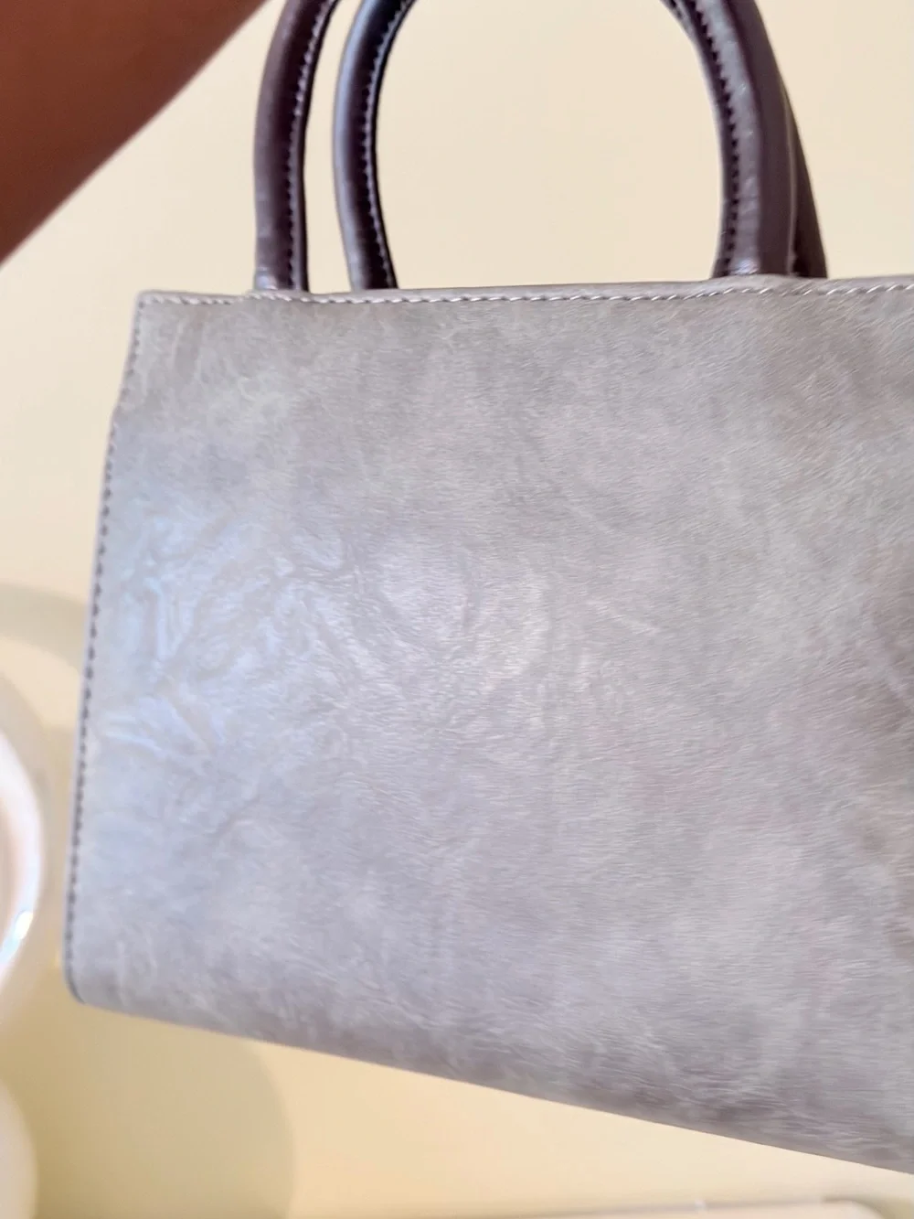Gray Suede Top-Handle Satchel with Pom Pom Charm